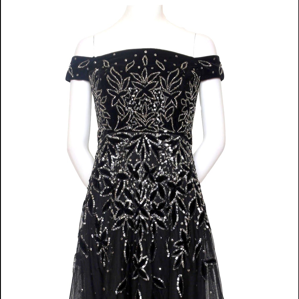 Black and sliver sequined Adrianna Pappell gown.